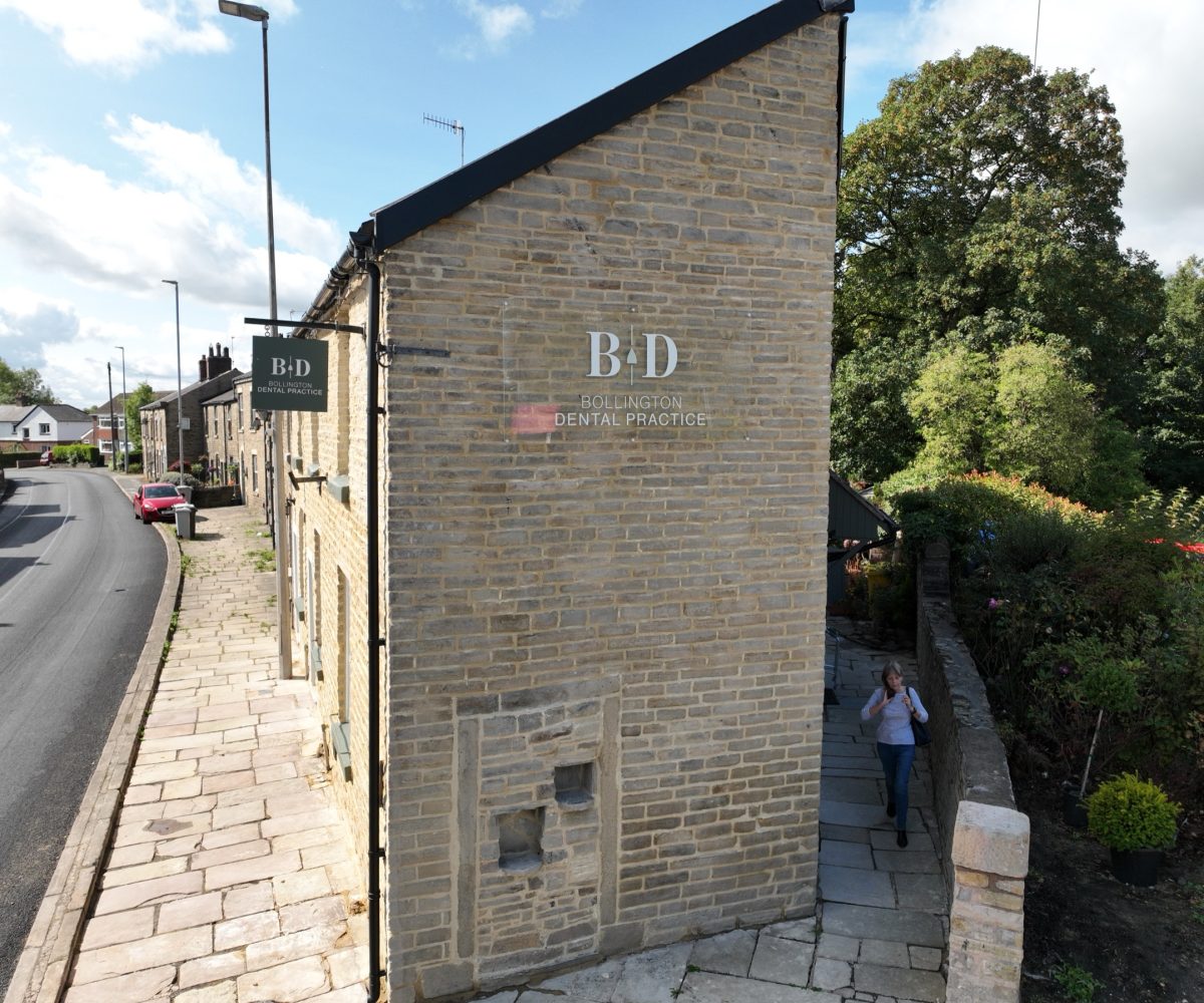 Bollington Dental Practice on Bollington Road, with its new painted B+D sign on the stone gable